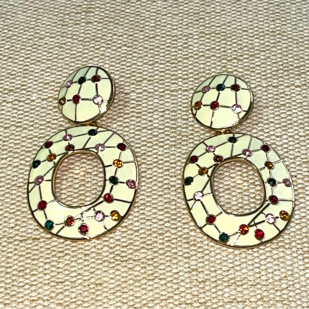 Sassy Jones gold earrings.